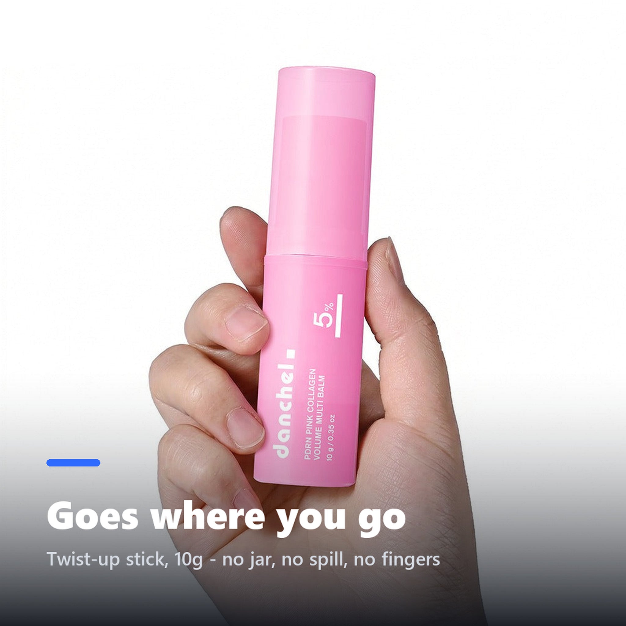 Hand holding a PDRN collagen balm stick