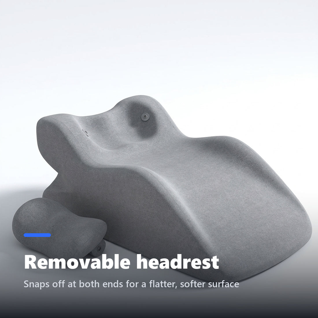 Face down pillow with the removable headrest bolster detached beside it